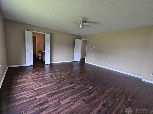8736 Gingerwood Ct, Franklin, OH 45005 - empty room with ceiling fan, dark wood finished floors, and a textured ceiling