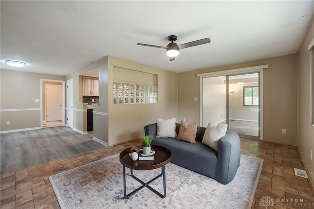 521 Park Ridge Dr, Centerville, OH 45459 - living area featuring ceiling fan and stone finish floors