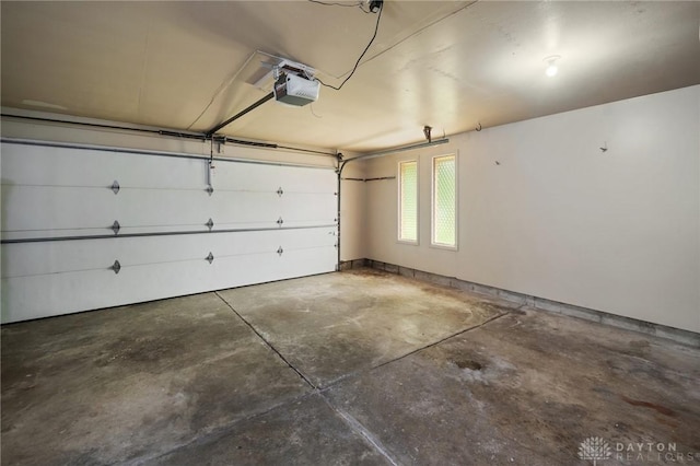 521 Park Ridge Dr, Centerville, OH 45459 - garage featuring a garage door opener