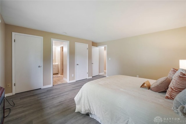 521 Park Ridge Dr, Centerville, OH 45459 - bedroom with wood finished floors and ensuite bathroom