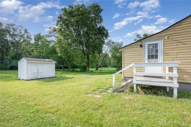 824 Euclid St, Bellefontaine, OH 43311 - view of grassy yard with a storage unit
