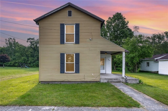 824 Euclid St, Bellefontaine, OH 43311 - view of front facade featuring a lawn