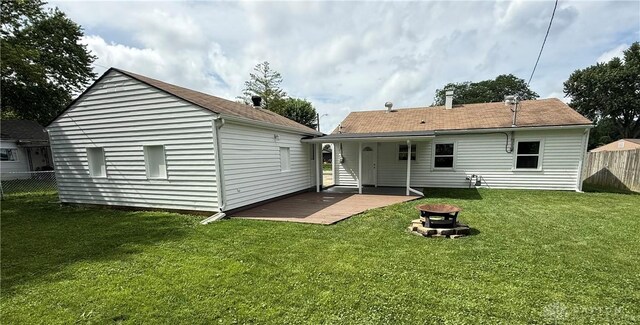 874 Bristol Dr, Vandalia, OH 45377 - back of house with an outdoor fire pit