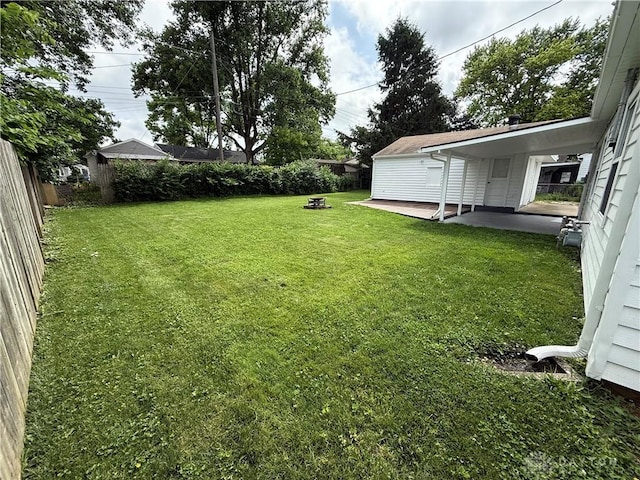 874 Bristol Dr, Vandalia, OH 45377 - fenced backyard featuring a patio