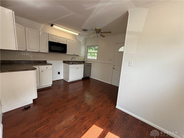 874 Bristol Dr, Vandalia, OH 45377 - kitchen featuring black microwave, a ceiling fan, dishwasher, tasteful backsplash, and dark wood-style floors