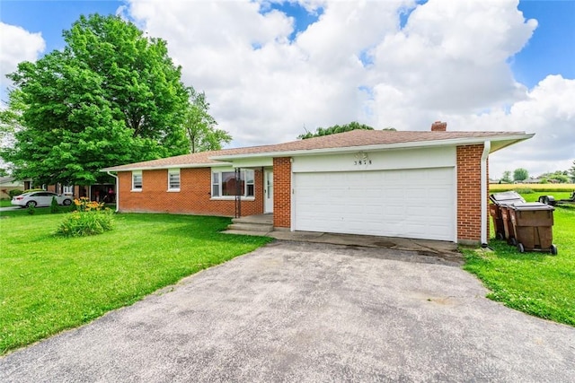 3878 State Route 49, Arcanum, OH 45304 - ranch-style home featuring driveway, an attached garage, brick siding, a chimney, and a front yard