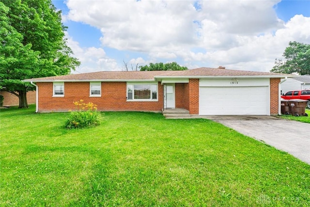 3878 State Route 49, Arcanum, OH 45304 - single story home featuring an attached garage, concrete driveway, a front yard, and brick siding