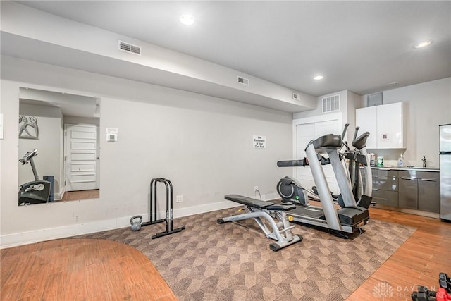 2356 Park Ave Unit 9, Cincinnati, OH 45206 - exercise room with recessed lighting and wood finished floors