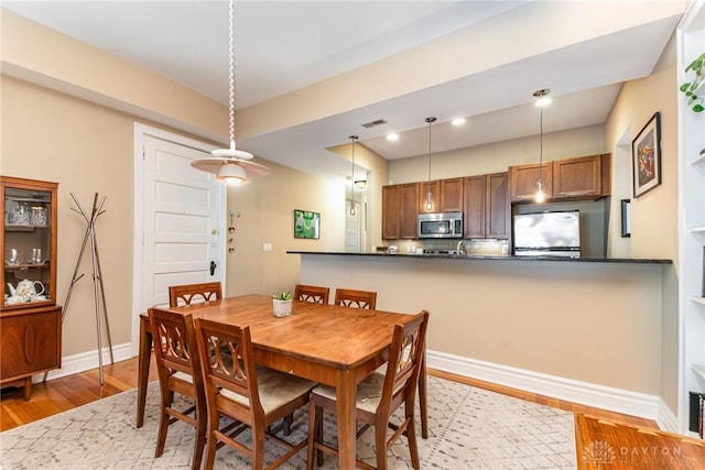 2356 Park Ave Unit 9, Cincinnati, OH 45206 - dining area featuring light wood-type flooring and recessed lighting