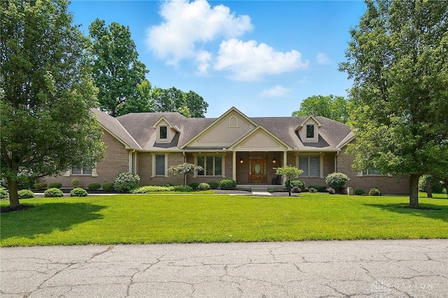 655 Devanshae Ct, Hamilton, OH 45013 - view of front of property featuring a front lawn and brick siding