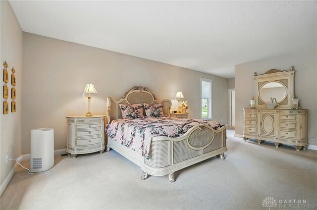 655 Devanshae Ct, Hamilton, OH 45013 - carpeted bedroom with baseboards