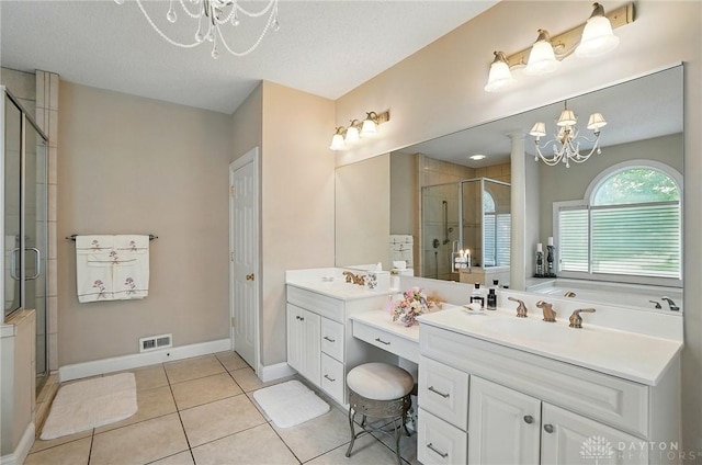 655 Devanshae Ct, Hamilton, OH 45013 - full bathroom with a chandelier, a shower stall, vanity, tile patterned flooring, and a bath