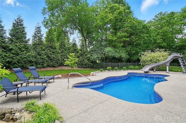 655 Devanshae Ct, Hamilton, OH 45013 - view of swimming pool with a water slide and a patio