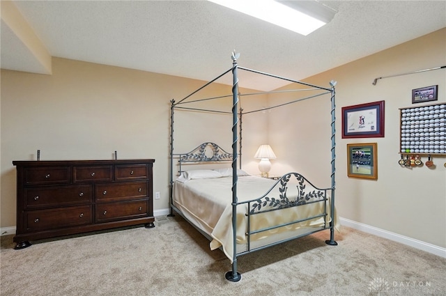 655 Devanshae Ct, Hamilton, OH 45013 - bedroom featuring light carpet and a textured ceiling