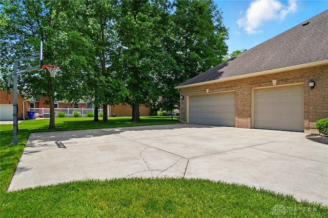 655 Devanshae Ct, Hamilton, OH 45013 - garage featuring concrete driveway