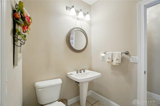 655 Devanshae Ct, Hamilton, OH 45013 - half bathroom with toilet and tile patterned floors