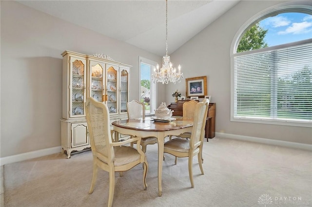 655 Devanshae Ct, Hamilton, OH 45013 - dining space featuring healthy amount of natural light, light colored carpet, a chandelier, and lofted ceiling