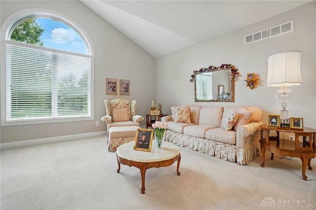 655 Devanshae Ct, Hamilton, OH 45013 - carpeted living room featuring lofted ceiling and baseboards
