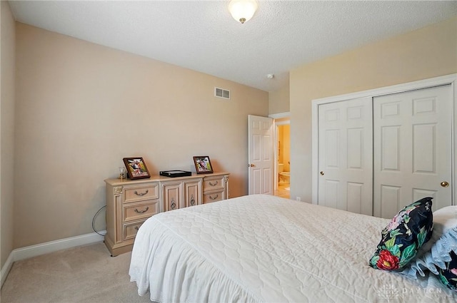 655 Devanshae Ct, Hamilton, OH 45013 - bedroom featuring light colored carpet and a closet