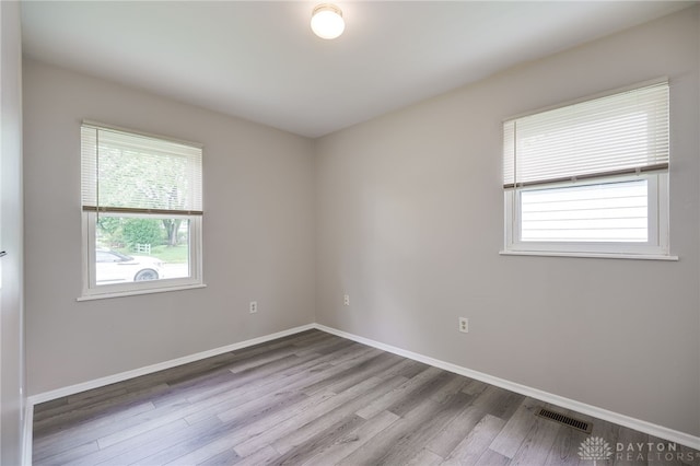 1919 Atkinson Dr, Xenia, OH 45385 - spare room featuring wood finished floors and baseboards