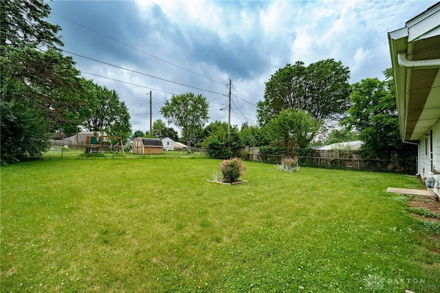 1919 Atkinson Dr, Xenia, OH 45385 - fenced backyard with an outbuilding