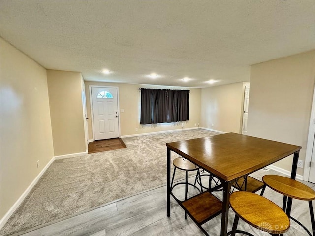 3626 Merwin 10 Mile Rd, Oh, OH 45245 - carpeted dining room featuring wood finished floors, a textured ceiling, and recessed lighting