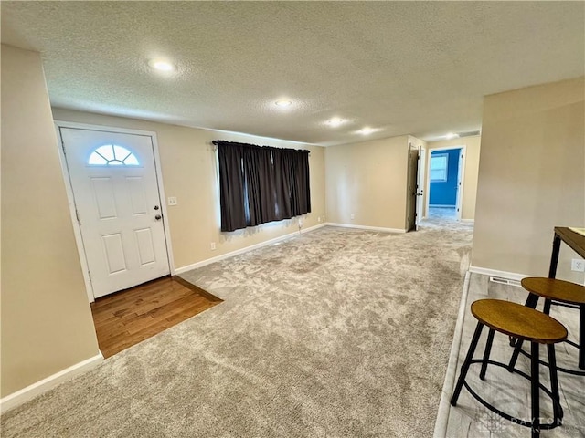 3626 Merwin 10 Mile Rd, Oh, OH 45245 - foyer featuring carpet flooring, a textured ceiling, recessed lighting, and healthy amount of natural light