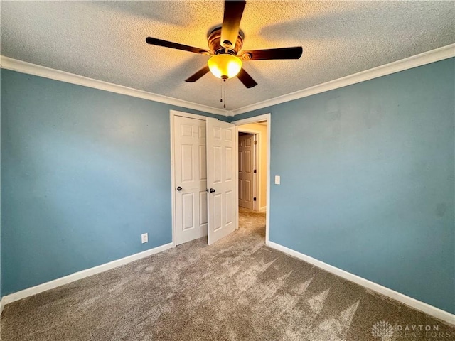3626 Merwin 10 Mile Rd, Oh, OH 45245 - unfurnished bedroom featuring a textured ceiling, carpet, crown molding, ceiling fan, and a closet