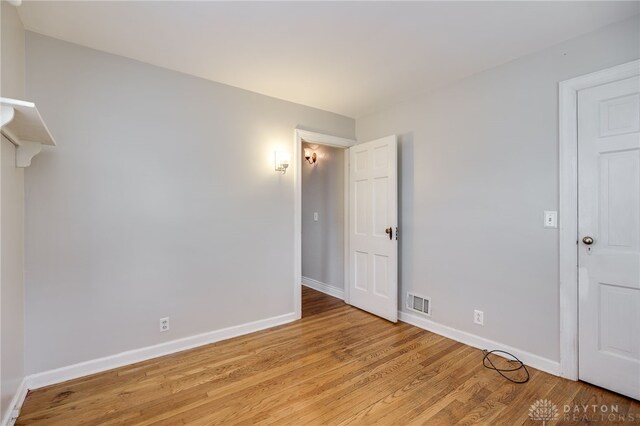 1603 Rosemont Blvd, Dayton, OH 45410 - unfurnished bedroom featuring baseboards and light wood-type flooring