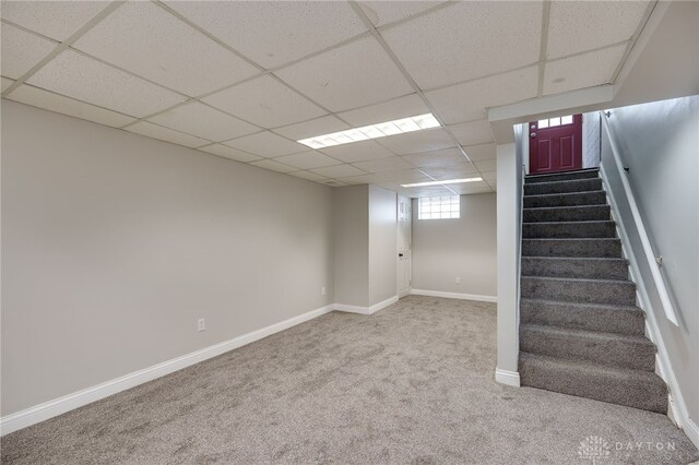 1603 Rosemont Blvd, Dayton, OH 45410 - below grade area with carpet floors, a drop ceiling, and stairs