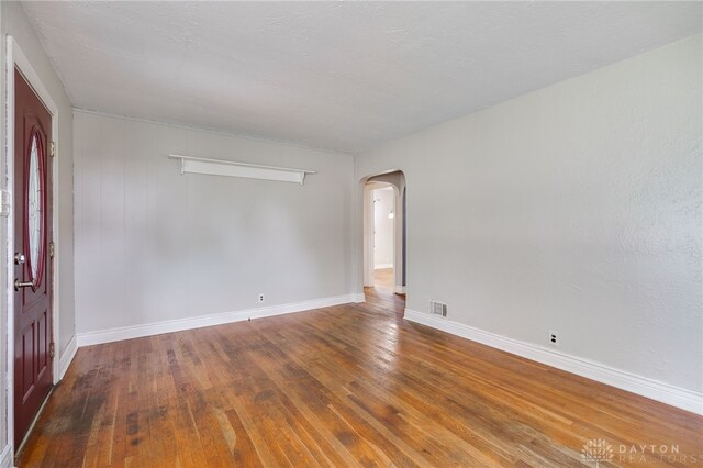 1603 Rosemont Blvd, Dayton, OH 45410 - unfurnished room with arched walkways and wood finished floors