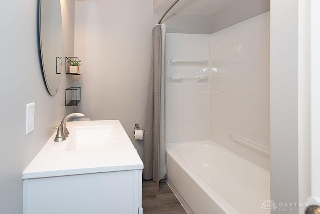 881 Garver Rd, Monroe, OH 45044 - full bathroom with vanity, shower / bath combo, and wood finished floors