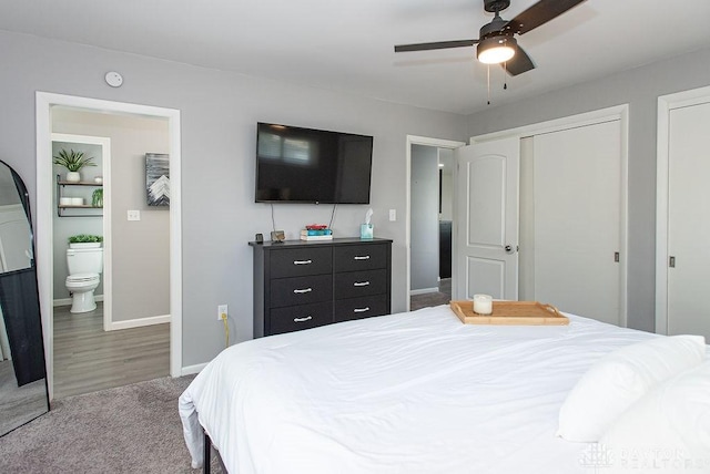 881 Garver Rd, Monroe, OH 45044 - bedroom with two closets, carpet, ensuite bath, and ceiling fan