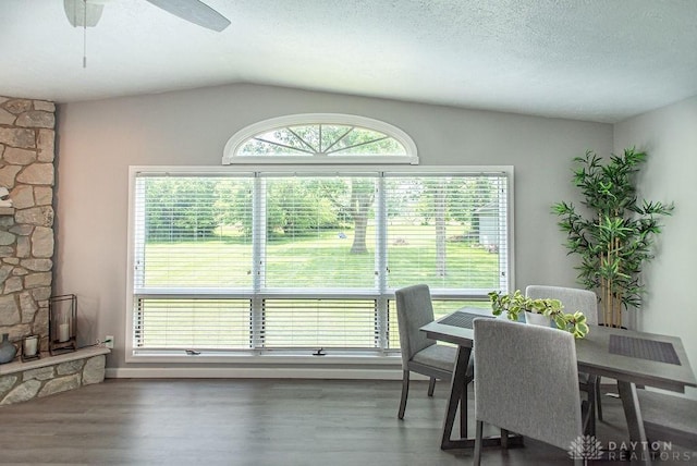 881 Garver Rd, Monroe, OH 45044 - dining space with wood finished floors, lofted ceiling, ceiling fan, and a textured ceiling