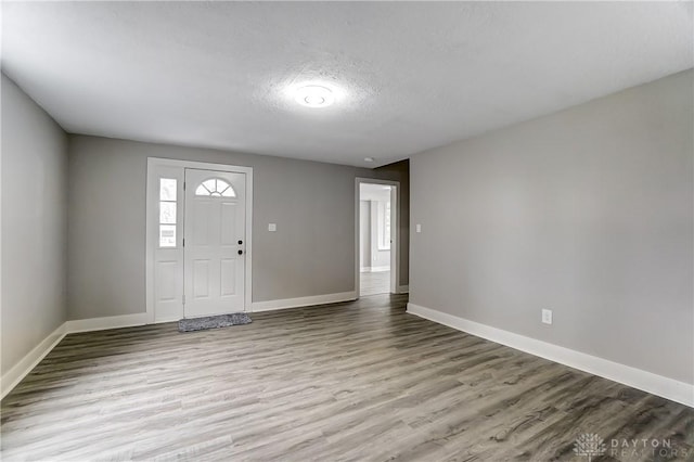 1601 Rausch Ave, Dayton, OH 45432 - entryway featuring wood finished floors and a textured ceiling