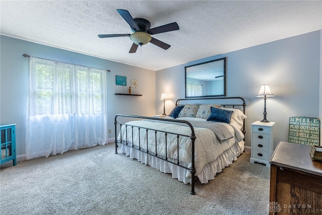 195 Sycamore Creek Dr, Springboro, OH 45066 - carpeted bedroom with a textured ceiling and ceiling fan