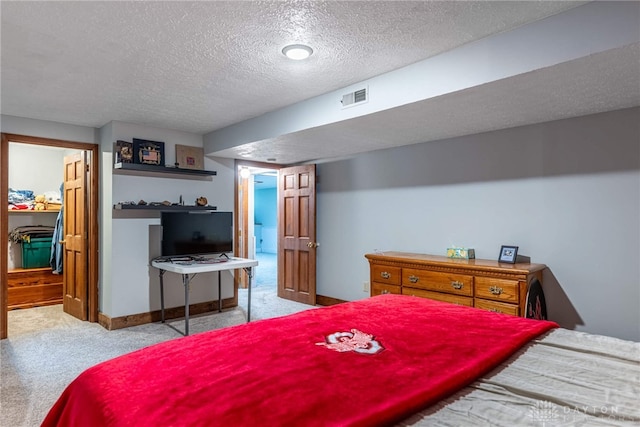 195 Sycamore Creek Dr, Springboro, OH 45066 - carpeted bedroom featuring a textured ceiling and baseboards
