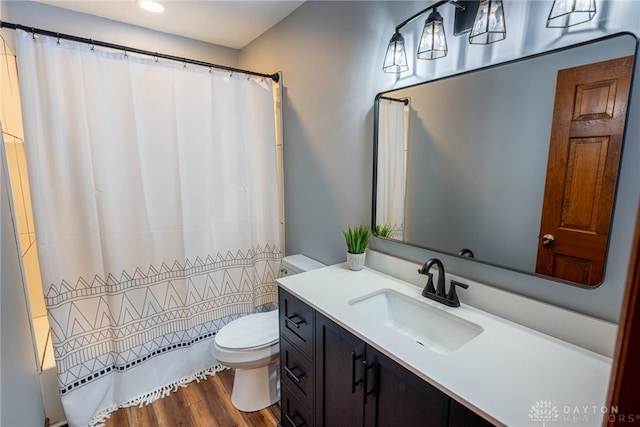 195 Sycamore Creek Dr, Springboro, OH 45066 - bathroom with vanity, wood finished floors, shower / bathtub combination with curtain, and recessed lighting