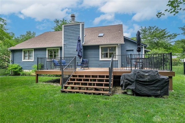 195 Sycamore Creek Dr, Springboro, OH 45066 - rear view of property with a wooden deck, a chimney, roof with shingles, and a yard