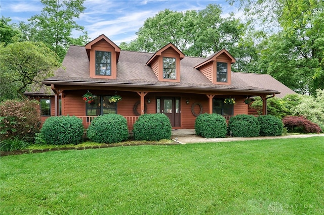 4911 Arabian Dr, Fairborn, OH 45324 - view of front facade with a front yard and covered porch