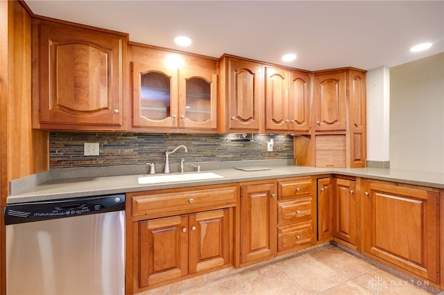 4911 Arabian Dr, Fairborn, OH 45324 - kitchen featuring dishwasher, tasteful backsplash, brown cabinetry, and recessed lighting