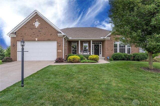 8695 Dijon Ct, Washington Twp, OH 45458 - view of front of home featuring brick siding, driveway, an attached garage, a front yard, and a shingled roof
