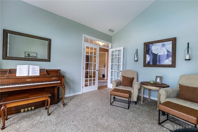 8695 Dijon Ct, Washington Twp, OH 45458 - living area featuring french doors, lofted ceiling, and carpet floors