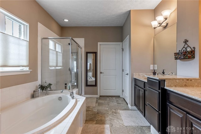 8695 Dijon Ct, Washington Twp, OH 45458 - bathroom featuring vanity, a bath, and a shower stall