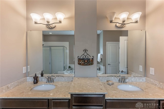 8695 Dijon Ct, Washington Twp, OH 45458 - bathroom featuring double vanity, a shower stall, and a chandelier