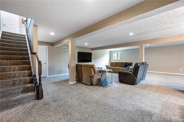 8695 Dijon Ct, Washington Twp, OH 45458 - living area with carpet floors, stairs, recessed lighting, and a textured ceiling