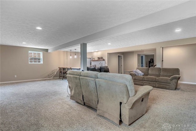8695 Dijon Ct, Washington Twp, OH 45458 - living area featuring light carpet, recessed lighting, and a textured ceiling