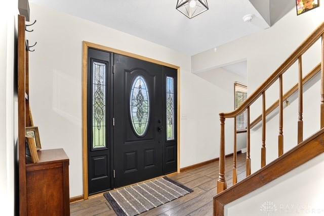 116 Whisman Dr, Middletown, OH 45042 - entrance foyer featuring wood finished floors and stairs