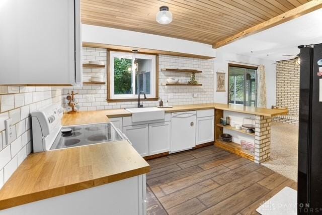 116 Whisman Dr, Middletown, OH 45042 - kitchen featuring open shelves, white appliances, butcher block countertops, a peninsula, and a wooden ceiling with exposed beams