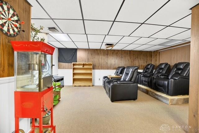 116 Whisman Dr, Middletown, OH 45042 - carpeted home theater with wood walls and a paneled ceiling
